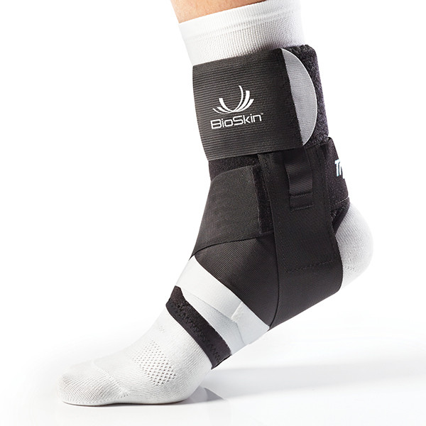 BioSkin TriLok ankle brace worn over a sock