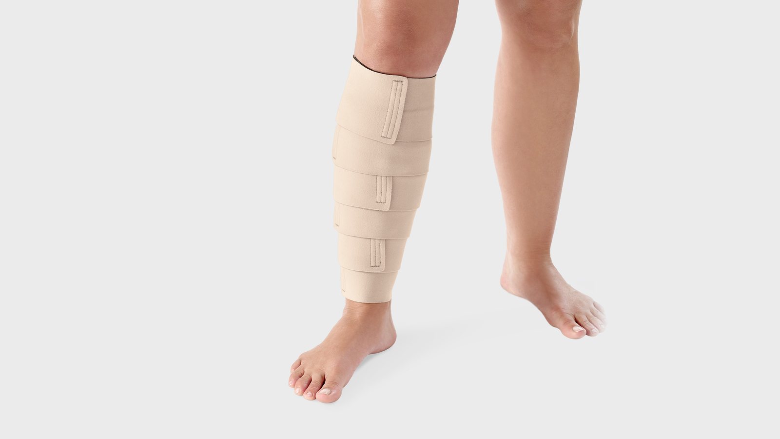 Beige L&R ReadyWrap adjustable compression wrap on the lower leg